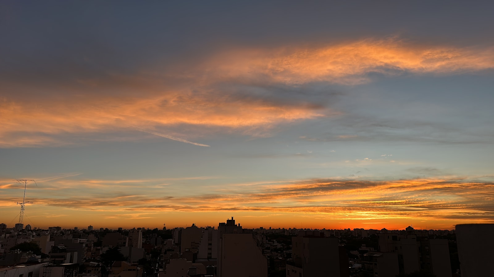 Modern residential tower in Buenos Aires at sunset